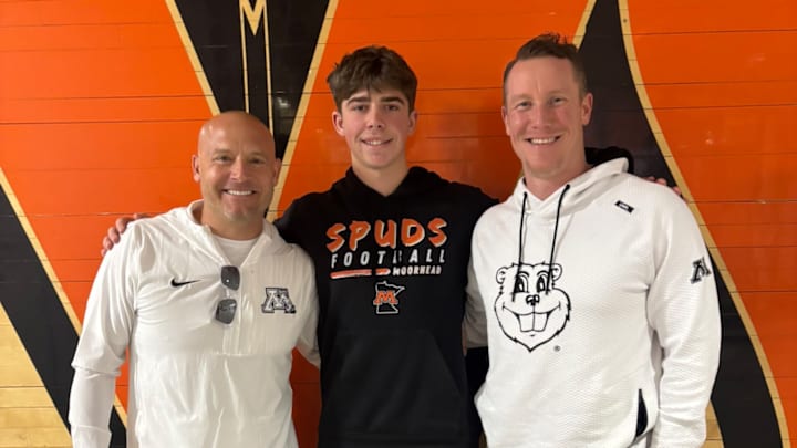Jett Feeney with Gophers head coach P.J. Fleck and offensive coordinator Greg Harbaugh Jr.