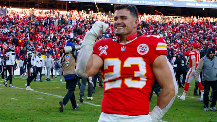 Dec 21, 2024; Kansas City, Missouri, USA; Kansas City Chiefs linebacker Drue Tranquill (23) celebrates after the win over the Houston Texans at GEHA Field at Arrowhead Stadium. Mandatory Credit: Denny Medley-Imagn Images