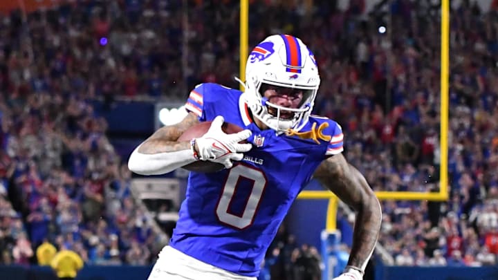 Sep 23, 2024; Orchard Park, New York, USA; Buffalo Bills wide receiver Keon Coleman (0) scores a touchdown against the Jacksonville Jaguars in the second quarter at Highmark Stadium. Mandatory Credit: Mark Konezny-Imagn Images