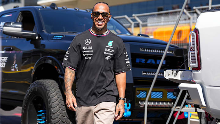 Oct 20, 2024; Austin, Texas, USA; Mercedes-AMG Petronas driver Lewis Hamilton walks the track ahead of the drivers' parade at the Formula 1 Pirelli United States Grand Prix at Circuit of the Americas. Mandatory Credit: Aaron E. Martinez-Imagn Images