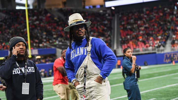 Dec. 16, 2023; Atlanta, Georgia, USA; Football star Cam Newton stands on the sidelines during the Cricket Celebration Bowl game between Florida A&M University and Howard University at Mercedes-Benz Stadium. FAMU defeated Howard 30-26.