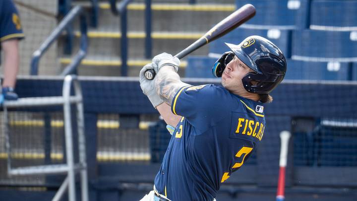 Milwaukee Brewers infield prospect Andrew Fischer hits during spring training workouts Tuesday, February 17, 2026, at American Family Fields of Phoenix in Phoenix, Arizona.