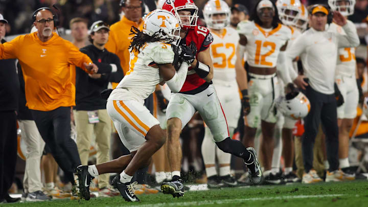 Nov 16, 2024; Athens, Georgia, USA; Georgia Bulldogs wide receiver London Humphreys (16) catches a pass in front of Tennessee Volunteers defensive back Jermod McCoy (3).