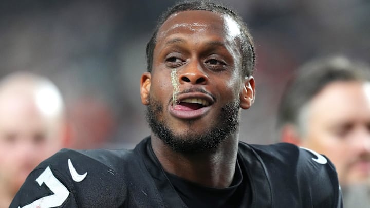 (EDITORS NOTE: obscene gesture in photo) Nov 23, 2025; Paradise, Nevada, USA; Vegas Raiders quarterback Geno Smith (7) gestures towards a fan after the Cleveland Browns defeated the Raiders 24-10 at Allegiant Stadium. Mandatory Credit: Stephen R. Sylvanie-Imagn Images 