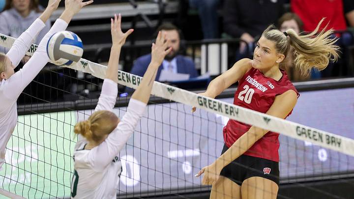 Wisconsin's Lynney Tarnow (20) spikes the ball against Wisconsin-Green Bay during an exhibition match on Saturday, April 18, 2026, at the Kress Center in Green Bay, Wis. Wisconsin won all five sets of the match.
Tork Mason/USA TODAY NETWORK-Wisconsin