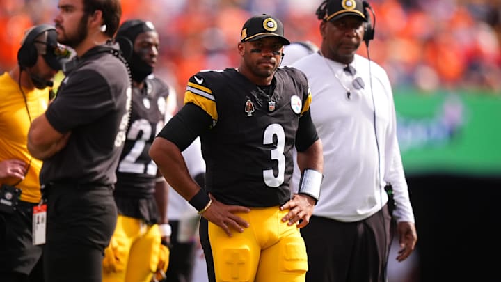 Sep 15, 2024; Denver, Colorado, USA; Pittsburgh Steelers quarterback Russell Wilson (3) during a injury time out in the second quarter against the Denver Broncos at Empower Field at Mile High. Mandatory Credit: Ron Chenoy-Imagn Images