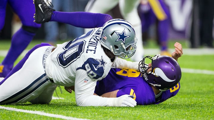 Dallas Cowboys defensive lineman DeMarcus Lawrence (90) tackles Minnesota Vikings quarterback. Mandatory Credit: Brad Rempel-Imagn Images Dallas Cowboys defensive lineman DeMarcus Lawrence (90) tackles Minnesota Vikings quarterback. Mandatory Credit: Brad Rempel-Imagn Images
