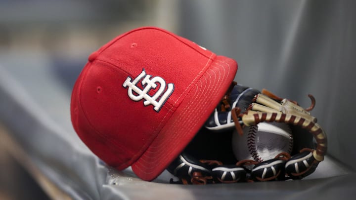 Sep 17, 2018; Atlanta, GA, USA; Detailed view of a St. Louis Cardinals hat and glove in the dugout against the Atlanta Braves in the first inning at SunTrust Park. Mandatory Credit: Brett Davis-Imagn Images
Sep 17, 2018; Atlanta, GA, USA; Detailed view of a St. Louis Cardinals hat and glove in the dugout against the Atlanta Braves in the first inning at SunTrust Park. Mandatory Credit: Brett Davis-Imagn Images