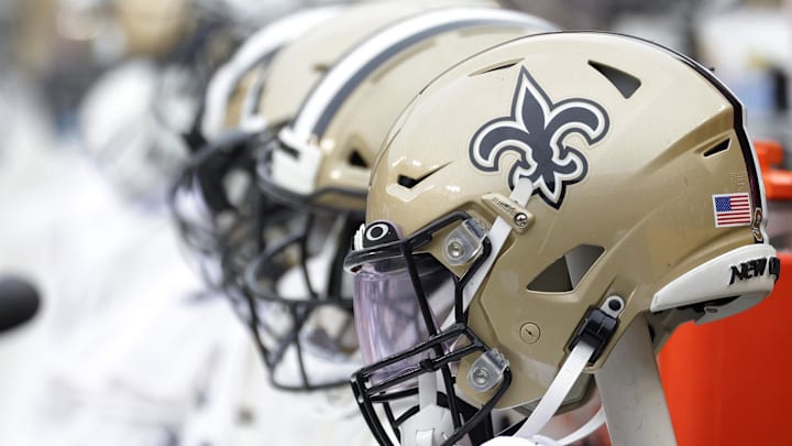 Oct 10, 2021; Landover, Maryland, USA; New Orleans Saints players' helmets on the bench against the Washington Football Team at FedExField. Mandatory Credit: Geoff Burke-Imagn Images