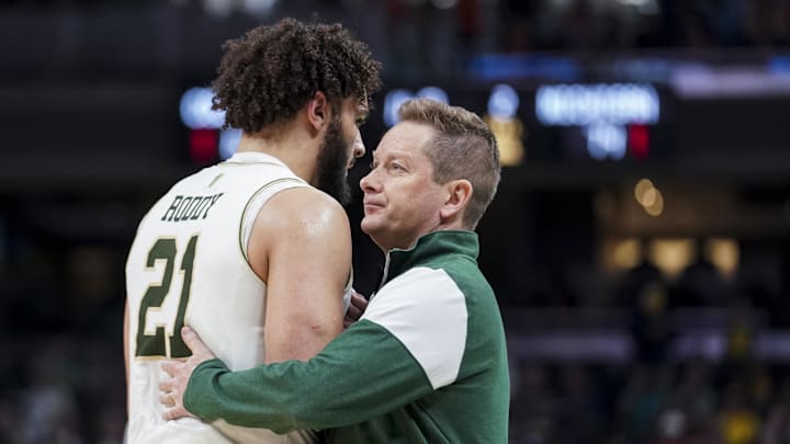 Mar 17, 2022; Indianapolis, IN, USA; Colorado State Rams guard David Roddy (21) hugs head coach Niko Medved in the game against the Michigan Wolverines in the second half during the first round of the 2022 NCAA Tournament at Gainbridge Fieldhouse. Mandatory Credit: Robert Goddin-Imagn Images Mar 17, 2022; Indianapolis, IN, USA; Colorado State Rams guard David Roddy (21) hugs head coach Niko Medved in the game against the Michigan Wolverines in the second half during the first round of the 2022 NCAA Tournament at Gainbridge Fieldhouse. Mandatory Credit: Robert Goddin-Imagn Images