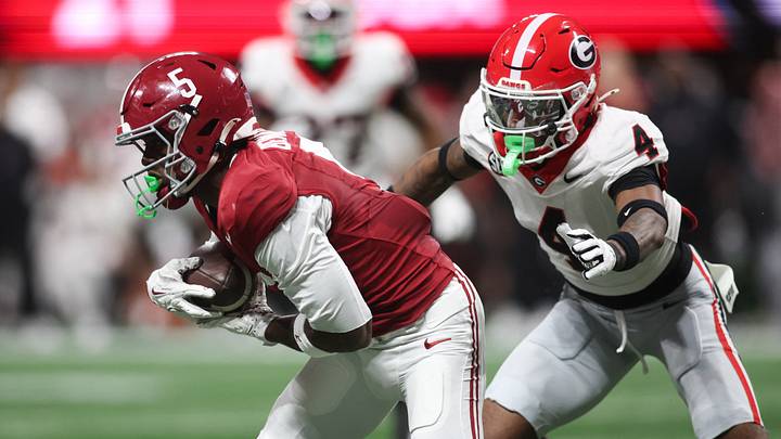 Dec 6, 2025; Atlanta, GA, USA; Alabama Crimson Tide wide receiver Germie Bernard (5) makes a catch as Georgia Bulldogs defensive back Kj Bolden (4) defends during the fourth quarter during the 2025 SEC Championship game at Mercedes-Benz Stadium. Mandatory Credit: Brett Davis-Imagn Images Dec 6, 2025; Atlanta, GA, USA; Alabama Crimson Tide wide receiver Germie Bernard (5) makes a catch as Georgia Bulldogs defensive back Kj Bolden (4) defends during the fourth quarter during the 2025 SEC Championship game at Mercedes-Benz Stadium. Mandatory Credit: Brett Davis-Imagn Images