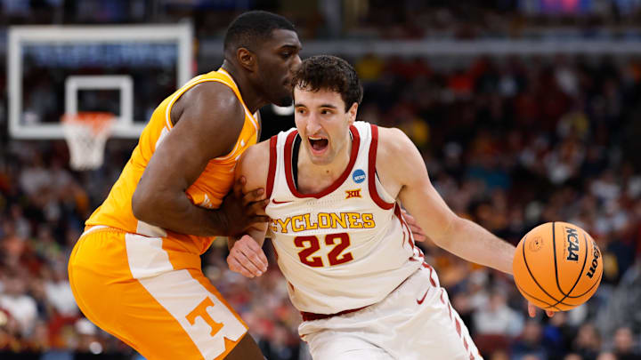 Mar 27, 2026; Chicago, IL, USA; Iowa State Cyclones forward Milan Momcilovic (22) drives the ball against Tennessee Volunteers forward Jaylen Carey (23) in the first half during a Sweet Sixteen game of the Midwest Regional of the men's 2026 NCAA Tournament at United Center. 