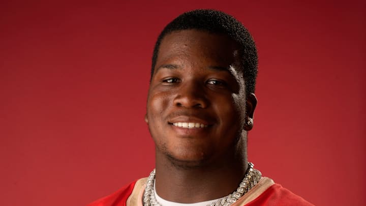 Cardinal Mooney Catholic High School defensive lineman Elijah Golden (#90).