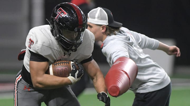 Texas Tech's Cameron Dickey does a drill during a spring practice, Tuesday, April 9, 2024, at the Sports Performance Center.