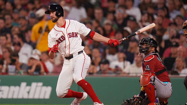 Aug 17, 2026; Boston, Massachusetts, USA; Boston Red Sox left fielder Eli White (38) gets a base hit to drive in a rune against the Arizona Diamondbacks in the second inning at Fenway Park. Mandatory Credit: David Butler II-Imagn Images