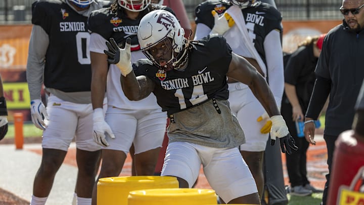 Jan 29, 2025; Mobile, AL, USA;  American team defensive lineman Shemar Stewart of Texas A&M (14) works through drills during Senior Bowl practice at Hancock Whitney Stadium. Mandatory Credit: Vasha Hunt-Imagn Images