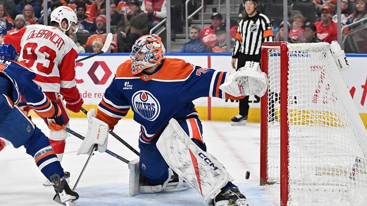 Dec 11, 2025; Edmonton, Alberta, CAN; Edmonton Oilers goalie Stuart Skinner (74) and Detroit Red Wings right winger Alex DeBrincat (93) are seen out on the ice during the second period at Rogers Place. Mandatory Credit: Walter Tychnowicz-Imagn Images