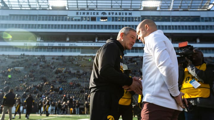 Iowa head coach Kirk Ferentz shakes hands with Minnesota head coach P.J. Fleck before a NCAA Big Ten Conference football game, Saturday, Nov., 16, 2019, at Kinnick Stadium in Iowa City, Iowa.

191114 Minn Iowa Fb 008 Jpg