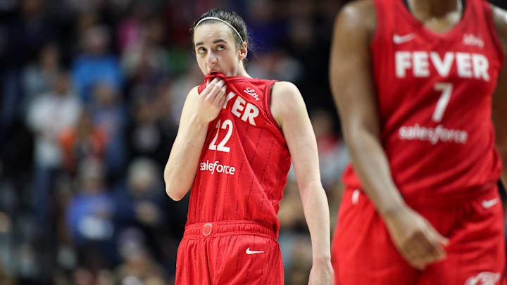 Sep 25, 2024; Uncasville, Connecticut, USA; Indiana Fever guard Caitlin Clark (22) reacts during the second half against the Connecticut Sun during game two of the first round of the 2024 WNBA Playoffs at Mohegan Sun Arena. Mandatory Credit: Paul Rutherford-Imagn Images Sep 25, 2024; Uncasville, Connecticut, USA; Indiana Fever guard Caitlin Clark (22) reacts during the second half against the Connecticut Sun during game two of the first round of the 2024 WNBA Playoffs at Mohegan Sun Arena. Mandatory Credit: Paul Rutherford-Imagn Images