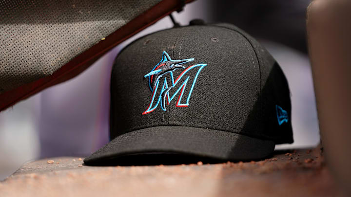 Apr 11, 2019; Cincinnati, OH, USA; A view of a New Era Miami Marlins hat in the dugout during the game against the Cincinnati Reds at Great American Ball Park. Mandatory Credit: Aaron Doster-Imagn Images Apr 11, 2019; Cincinnati, OH, USA; A view of a New Era Miami Marlins hat in the dugout during the game against the Cincinnati Reds at Great American Ball Park. Mandatory Credit: Aaron Doster-Imagn Images