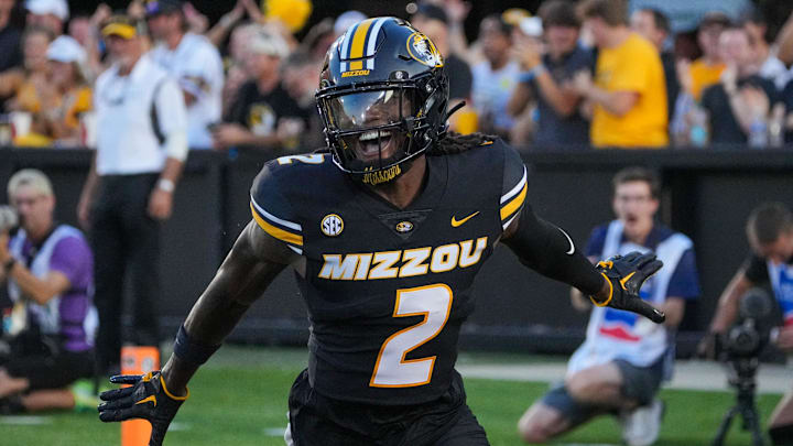 Aug 29, 2024; Columbia, Missouri, USA; Missouri Tigers cornerback Toriano Pride Jr. (2) celebrates after scoring against the Murray State Racers on a pick six during the first half at Faurot Field at Memorial Stadium. 