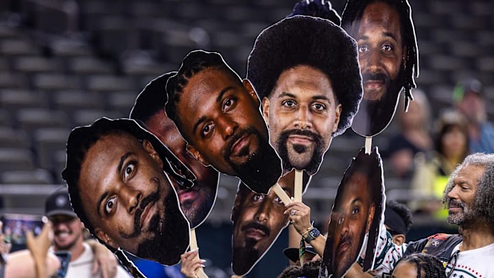 Dec 21, 2025; New Orleans, Louisiana, USA;  New Orleans Saints defensive end Cameron Jordan (94) poses for pictures with his family during warm ups before the game against the New York Jets at Caesars Superdome. Mandatory Credit: Stephen Lew-Imagn Images