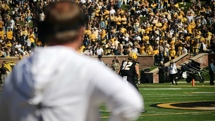 Oct 20, 2024; Columbia, Missouri, USA; Missouri Tigers coach Eli Drinkwitz looks at the field prior to a kickoff against the Auburn Tigers at Faurot Field at Memorial Stadium. Oct 20, 2024; Columbia, Missouri, USA; Missouri Tigers coach Eli Drinkwitz looks at the field prior to a kickoff against the Auburn Tigers at Faurot Field at Memorial Stadium.