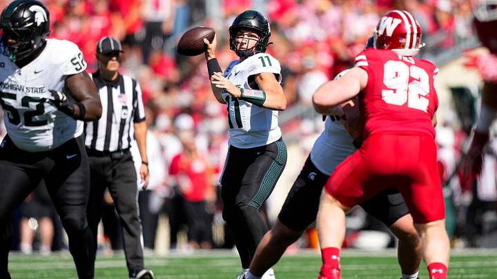 Oct 3, 2026; Madison, Wisconsin, USA; Michigan State Spartans quarterback Alessio Milivojevic (11) throws a pass during the second quarter against the Wisconsin Badgers at Camp Randall Stadium. Mandatory Credit: Jeff Hanisch-Imagn Images Oct 3, 2026; Madison, Wisconsin, USA; Michigan State Spartans quarterback Alessio Milivojevic (11) throws a pass during the second quarter against the Wisconsin Badgers at Camp Randall Stadium. Mandatory Credit: Jeff Hanisch-Imagn Images