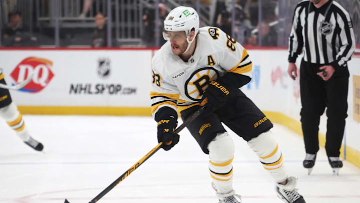 Mar 8, 2026; Pittsburgh, Pennsylvania, USA;  Boston Bruins right wing David Pastrnak (88) skates with the puck against the Pittsburgh Penguins during the third period at PPG Paints Arena. Mandatory Credit: Charles LeClaire-Imagn Images