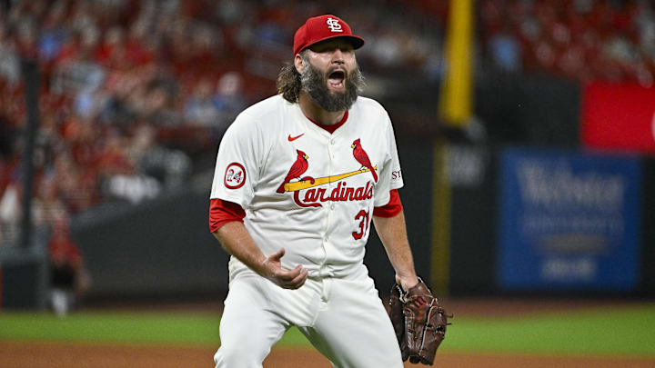 Sep 17, 2024; St. Louis, Missouri, USA;  St. Louis Cardinals starting pitcher Lance Lynn (31) reacts after inning ending double play against the Pittsburgh Pirates during the fifth inning at Busch Stadium. Mandatory Credit: Jeff Curry-Imagn Images