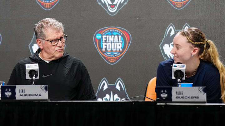 Apr 4, 2024; Cleveland, OH, USA; UConn Huskies coach Geno Auriemma (left) and guard Paige Bueckers during press conference at Rocket Mortgage FieldHouse. Mandatory Credit: Kirby Lee-Imagn Images Apr 4, 2024; Cleveland, OH, USA; UConn Huskies coach Geno Auriemma (left) and guard Paige Bueckers during press conference at Rocket Mortgage FieldHouse. Mandatory Credit: Kirby Lee-Imagn Images