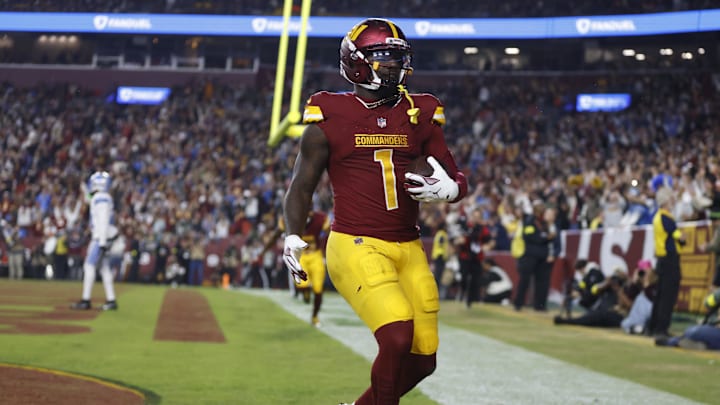 Nov 9, 2025; Landover, Maryland, USA; Washington Commanders wide receiver Deebo Samuel Sr. (1) reacts after scoring a touchdown during the third quarter against the Detroit Lions at Northwest Stadium. 