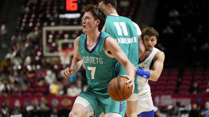 Jul 14, 2025; Las Vegas, NV, USA; Charlotte Hornets guard Kon Knueppel (7) controls the ball against the Dallas Mavericks during the second half of a NBA basketball game at the Thomas & Mack Center. Mandatory Credit: Lucas Peltier-Imagn Images