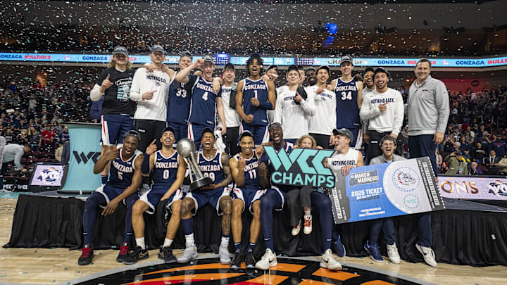 Gonzaga Bulldogs celebrate after defeating the Saint Mary's Gaels in the West Coast Conference tournament championship game at Orleans Arena