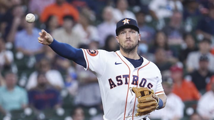 Apr 5, 2023; Houston, Texas, USA; Houston Astros third baseman Alex Bregman (2) throws out a runner at first base during the first inning against the Detroit Tigers at Minute Maid Park.