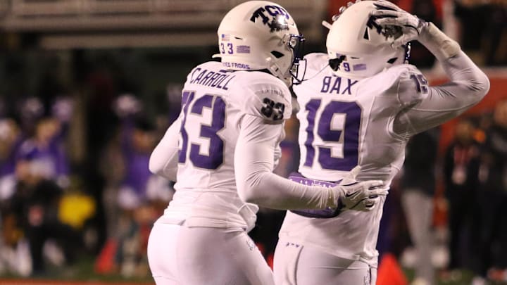 TCU defensive players Max Carroll and Jonathan Bax TCU defensive players Max Carroll and Jonathan Bax