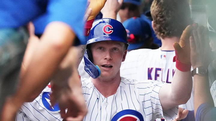 Aug 5, 2026; Chicago, Illinois, USA; Chicago Cubs center fielder Pete Crow-Armstrong (4) is greeted in the dugout after hitting a two-run home run against the Los Angeles Dodgers during the fourth inning at Wrigley Field. Mandatory Credit: David Banks-Imagn Images