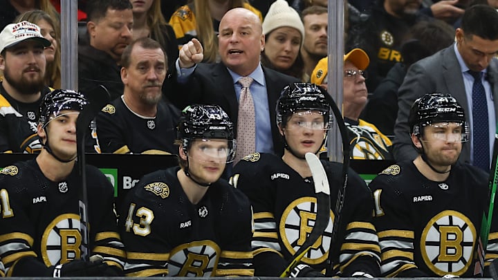 Boston Bruins head coach Jim Montgomery directs his players during the third period against the Winnipeg Jets at TD Garden. 