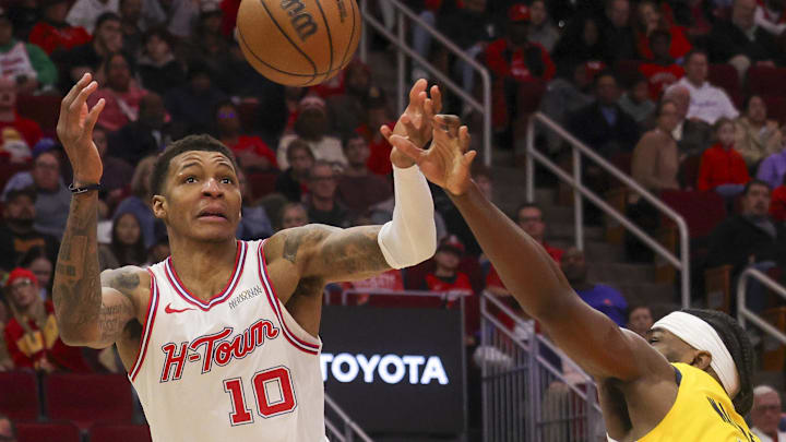 Dec 29, 2025; Houston, Texas, USA; Indiana Pacers forward Jarace Walker (5) knocks the ball away from Houston Rockets forward Jabari Smith Jr. (10)  in the third quarter at Toyota Center. Mandatory Credit: Thomas Shea-Imagn Images