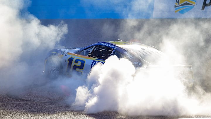 Mar 8, 2026; Avondale, Arizona, USA; Team Penske driver Ryan Blaney (12) celebrates his victory following the Straight Talk Wireless 500 at Phoenix Raceway.