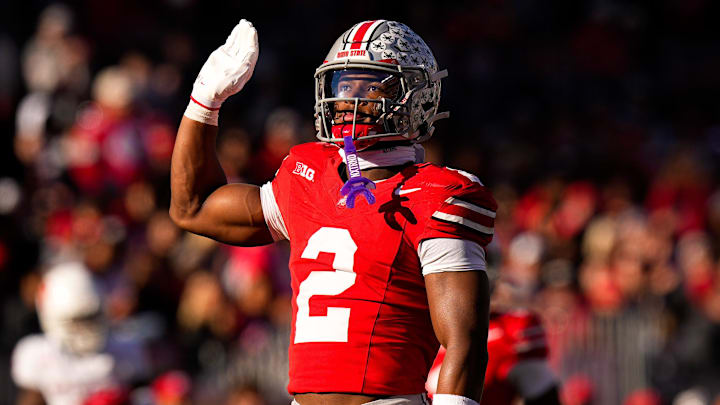 Ohio State Buckeyes defensive back Caleb Downs (2) celebrates