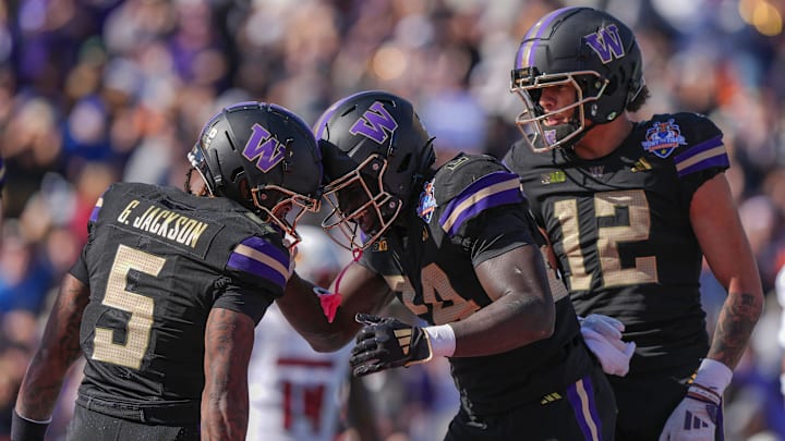 Washington player Giles Jackson (5) his touchdown against Louisville in the first quarter of the Tony the Tiger Sun Bowl game on Dec. 31, 2024.