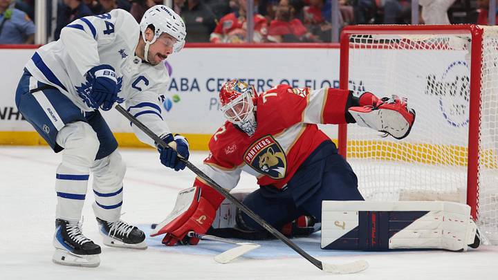 Dec 2, 2025; Sunrise, Florida, USA; Toronto Maple Leafs center Auston Matthews (34) shoots the puck but cannot score against Florida Panthers goaltender Sergei Bobrovsky (72) during the second period at Amerant Bank Arena. Mandatory Credit: Sam Navarro-Imagn Images