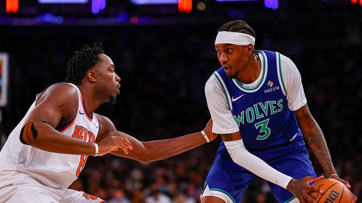 Timberwolves small forward Jaden McDaniels (3 goes head to head with New York's O.G. Anunoby.