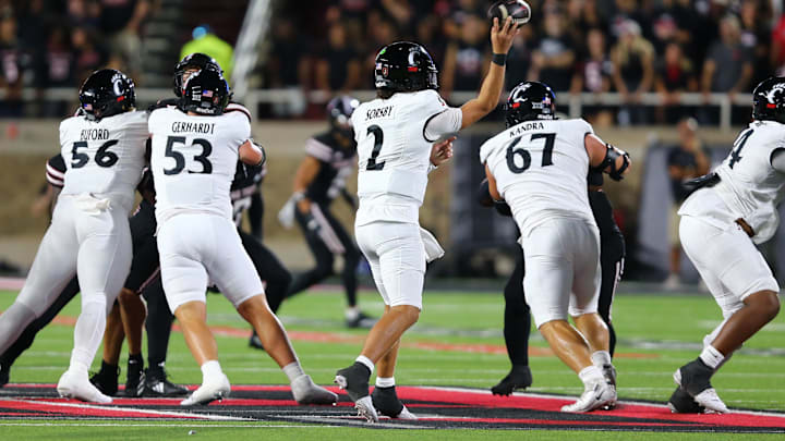 Sep 28, 2024; Lubbock, Texas, USA;  Cincinnati Bearcats quarterback Brendan Sorsby (2) passes against the Texas Tech Red Raiders in the first half at Jones AT&T Stadium and Cody Campbell Field. Mandatory Credit: Michael C. Johnson-Imagn Images