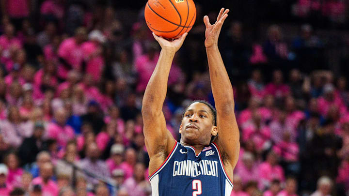 Jan 31, 2026; Omaha, Nebraska, USA; Connecticut Huskies guard Silas Demary Jr. (2) shoots the ball against the Creighton Bluejays during the first half at CHI Health Center Omaha. Mandatory Credit: Dylan Widger-Imagn Images