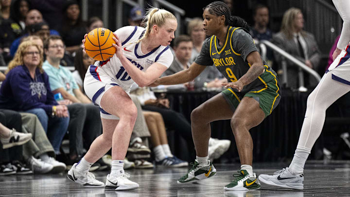 Mar 9, 2025; Kansas City, MO, USA; TCU Horned Frogs guard Hailey Van Lith (10) handles the ball while defended by Baylor Lady Bears guard Aliyah Matharu (9) during the second half at T-Mobile Center. Mandatory Credit: Amy Kontras-Imagn Images