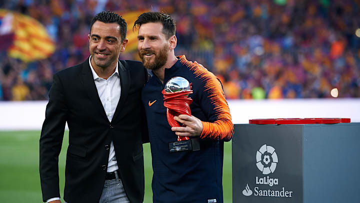 Lionel Messi y Xavi Hernández