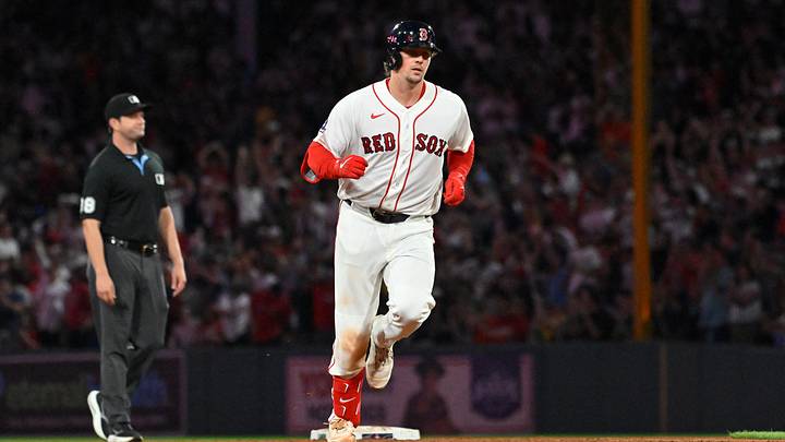 August 18, 2026; Boston, Massachusetts, USA; Boston Red Sox catcher Adley Rutschman (31) runs the bases after hitting a home run against the Arizona Diamondbacks during the third inning at Fenway Park. Mandatory Credit: Eric Canha-Imagn Images