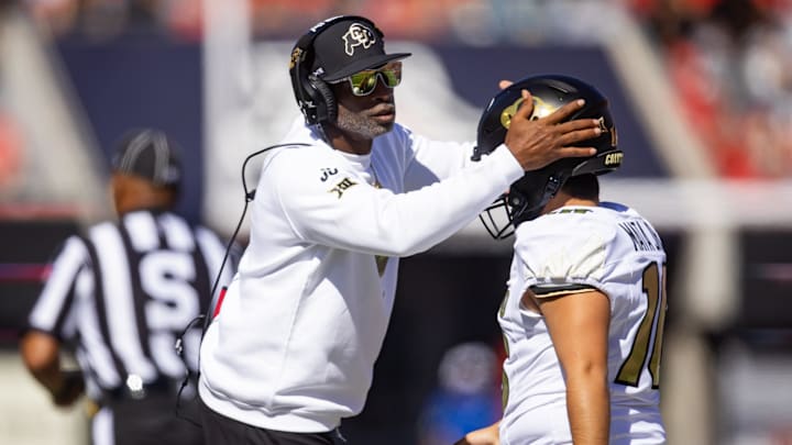 Oct 19, 2024; Tucson, Arizona, USA; Colorado Buffalos head coach Deion Sanders (left) embraces kicker Alejandro Mata against the Arizona Wildcats at Arizona Stadium. Mandatory Credit: Mark J. Rebilas-Imagn Images Oct 19, 2024; Tucson, Arizona, USA; Colorado Buffalos head coach Deion Sanders (left) embraces kicker Alejandro Mata against the Arizona Wildcats at Arizona Stadium. Mandatory Credit: Mark J. Rebilas-Imagn Images